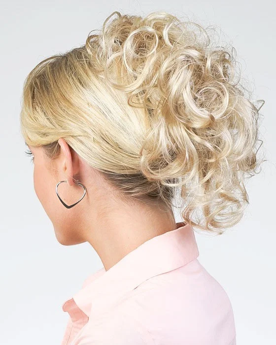 Ponytails with a pre - attached bow for a cute and girly look Redi-Twist Up